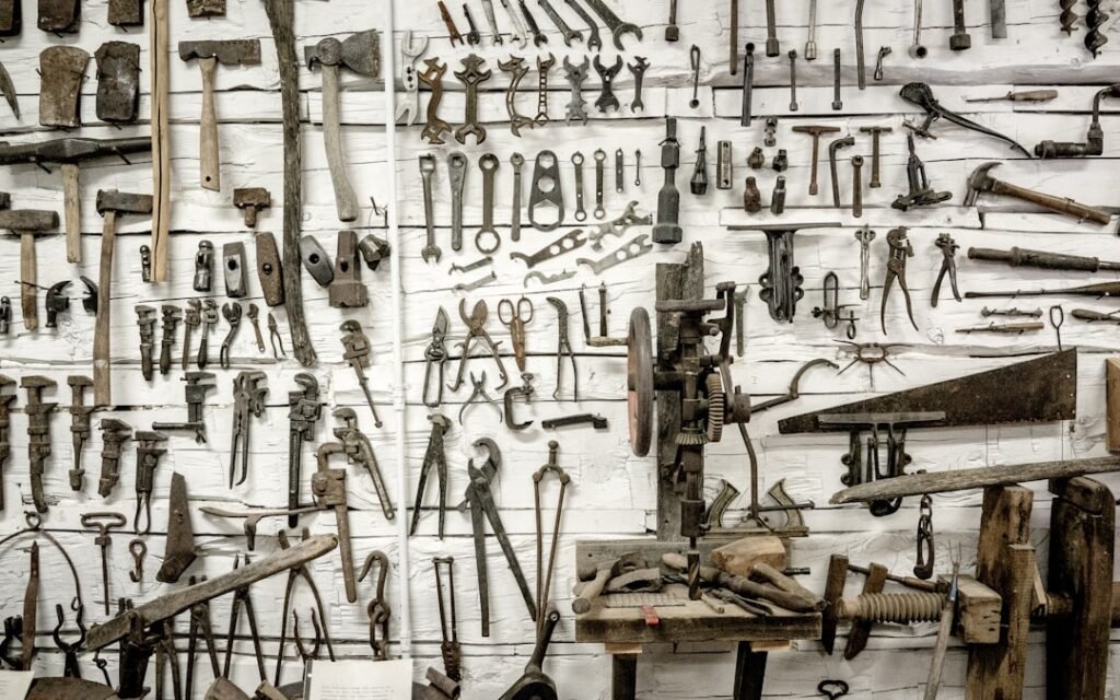 Hand tool against a wall, representing home improvement tools