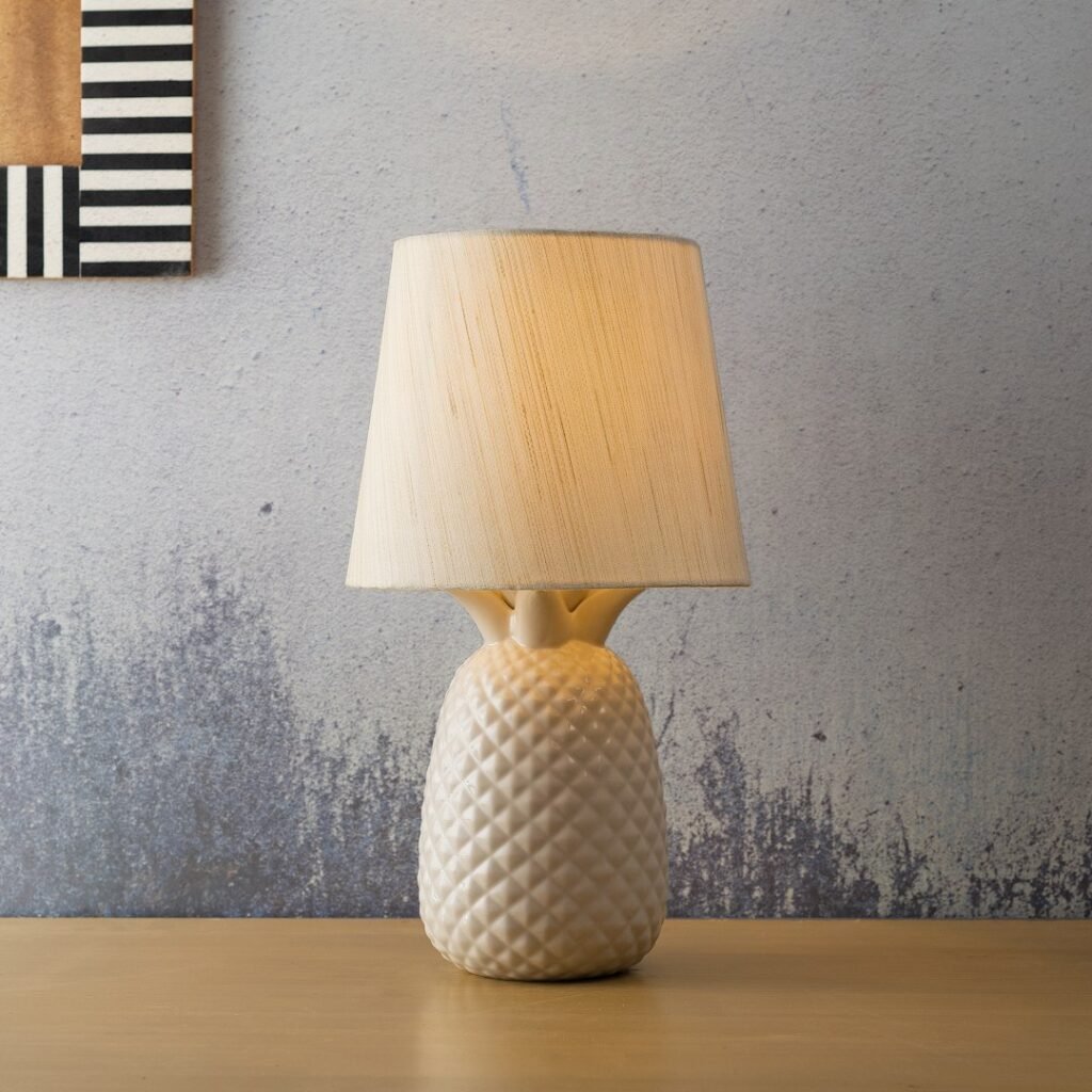 White table lamp on a wooden table